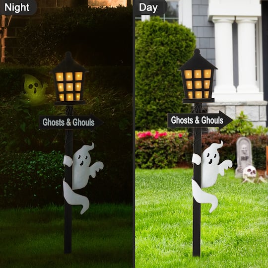 Glitzhome® 42" Lighted Halloween Haunted House Yard Stake with Timer